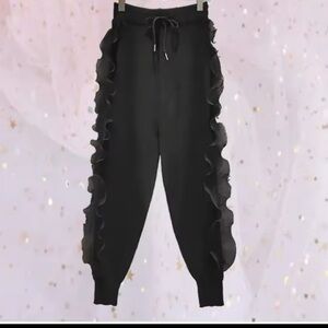 Pants with side ruffle